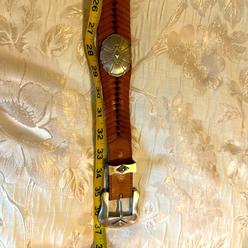 Western style brown leather belt.
